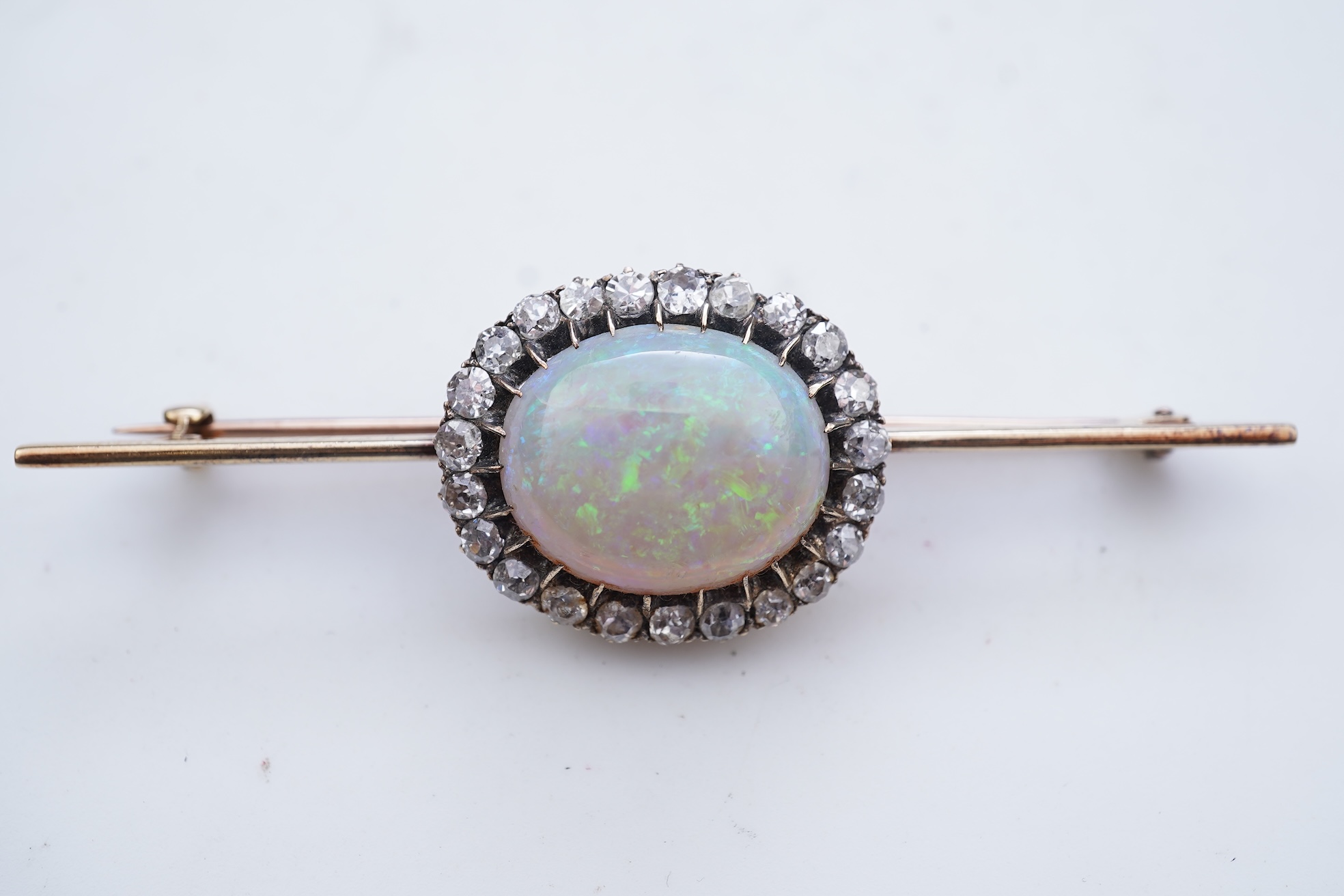An opal and diamond brooch, circa 1900